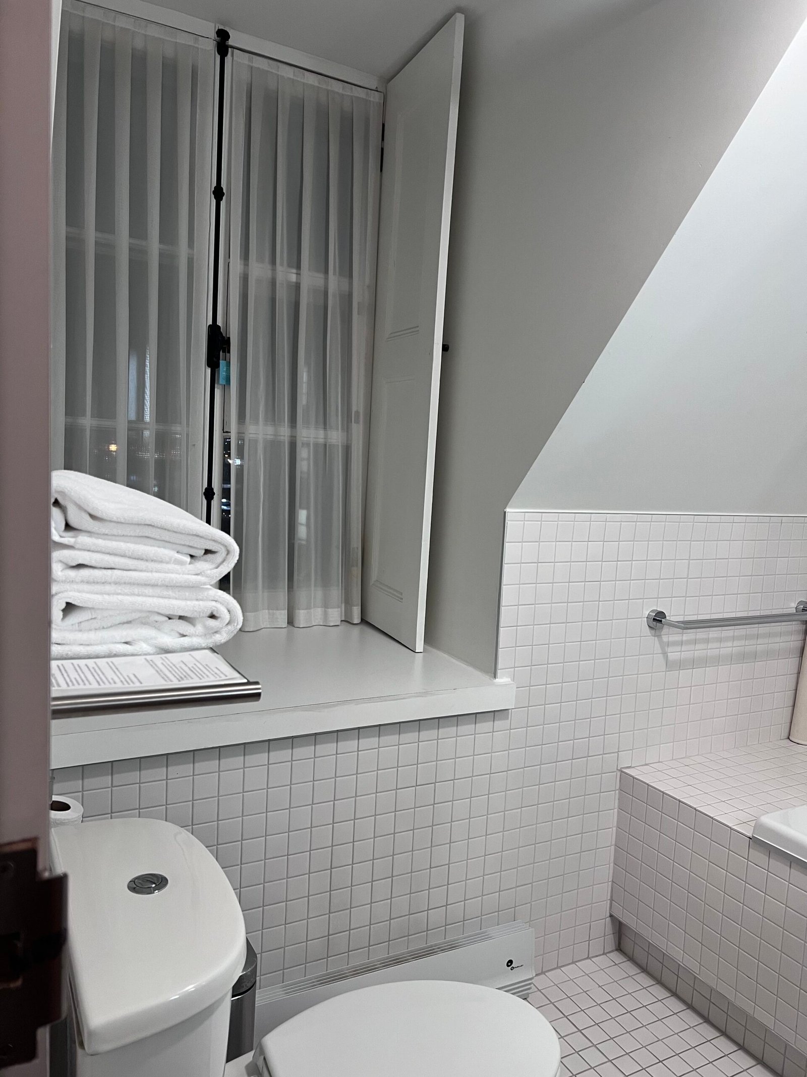 Inside Le Monastère des Augustines- A Wellness Retreat Rooted in 385 Years of History Bathroom Section at Contemporary King Room at Le Monastere des Augustines