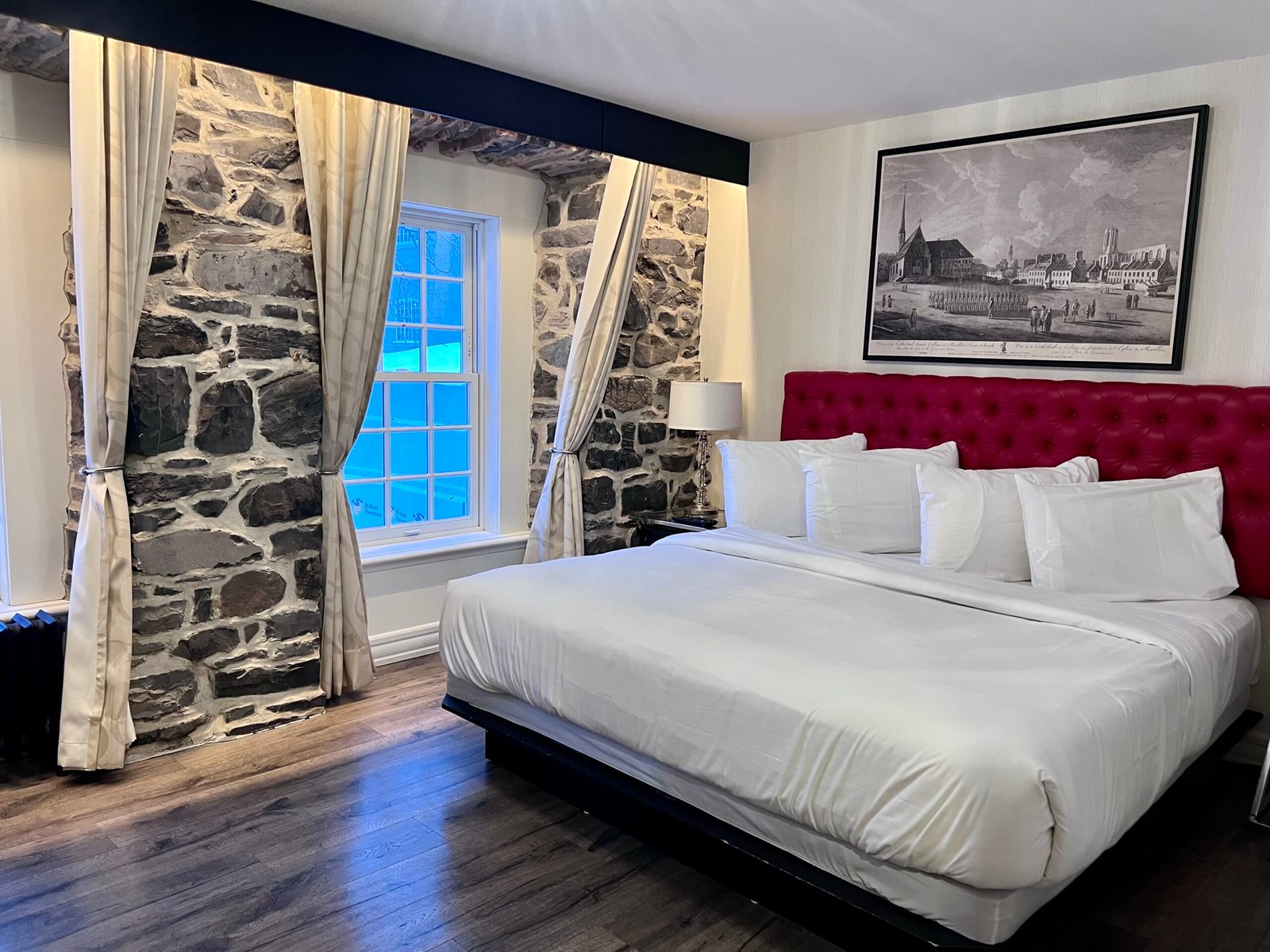How a 22-Room Hotel Competes With the Fairmont Chateau Frontenac (Boutique Hotel Economics) King size room overlooking Fairmont Chateau Frontenac at Auberge du Tresor